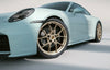 20/21-inch 911 Carrera lightweight wheel set painted in Neodyme.
